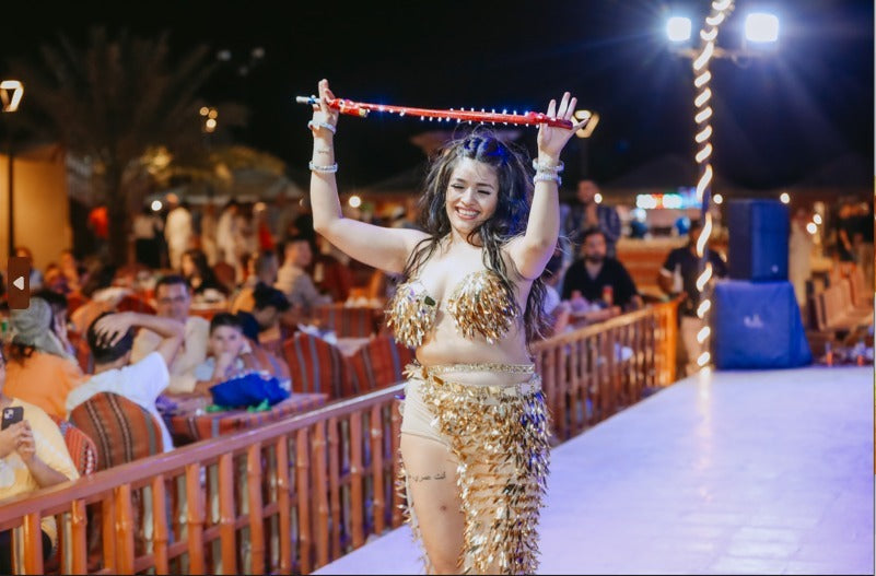 Belly dance performance at the Standard Desert Safari camp in Dubai entertaining guests