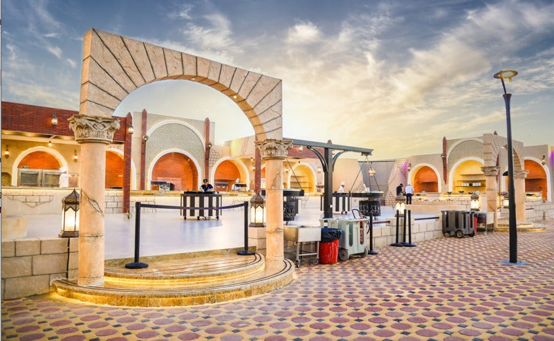 Buffet area at the desert safari camp in Dubai with a variety of dishes for guests