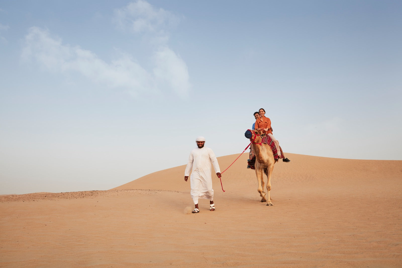 Guests enjoying camel riding at the King Desert Safari in Dubai