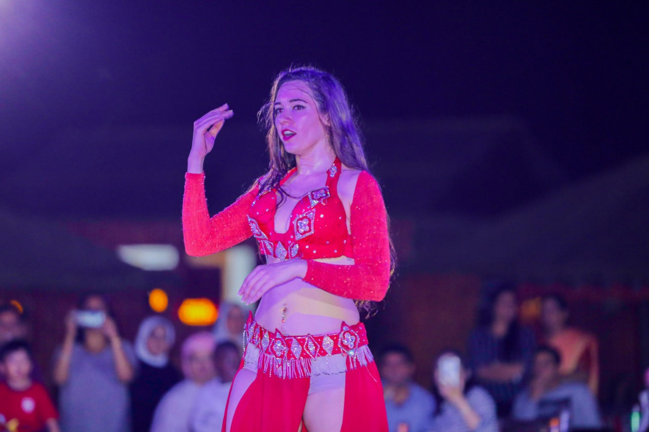 Live dance performance entertaining guests at the Standard Desert Safari camp in Dubai